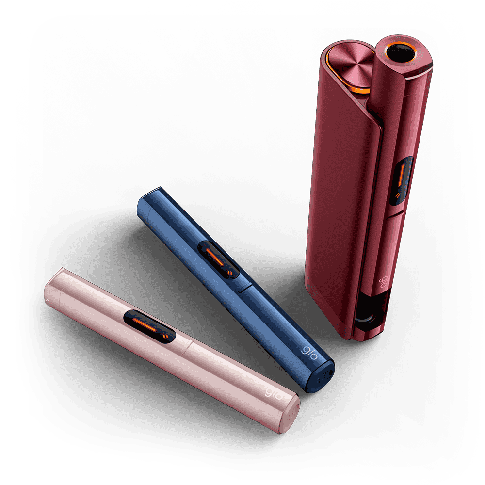 Three sleek electronic devices in pink, blue, and red are displayed on a light background. The red device stands upright, while the pink and blue ones lie flat. All have a modern, minimalist design with rounded edges.