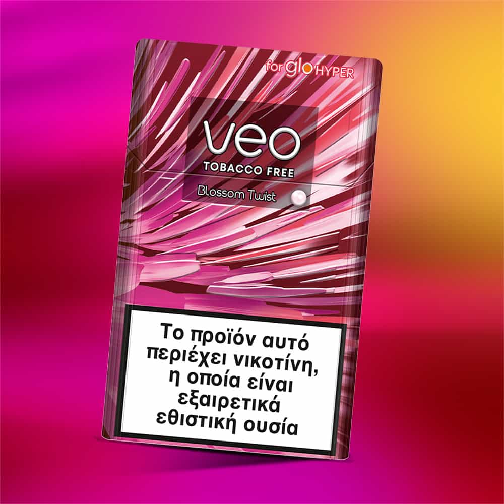 A pink and red pack of veo™ Blossom Twist for glo Hyper, featuring Greek text warning of nicotine’s addictive nature, on a vibrant gradient background.