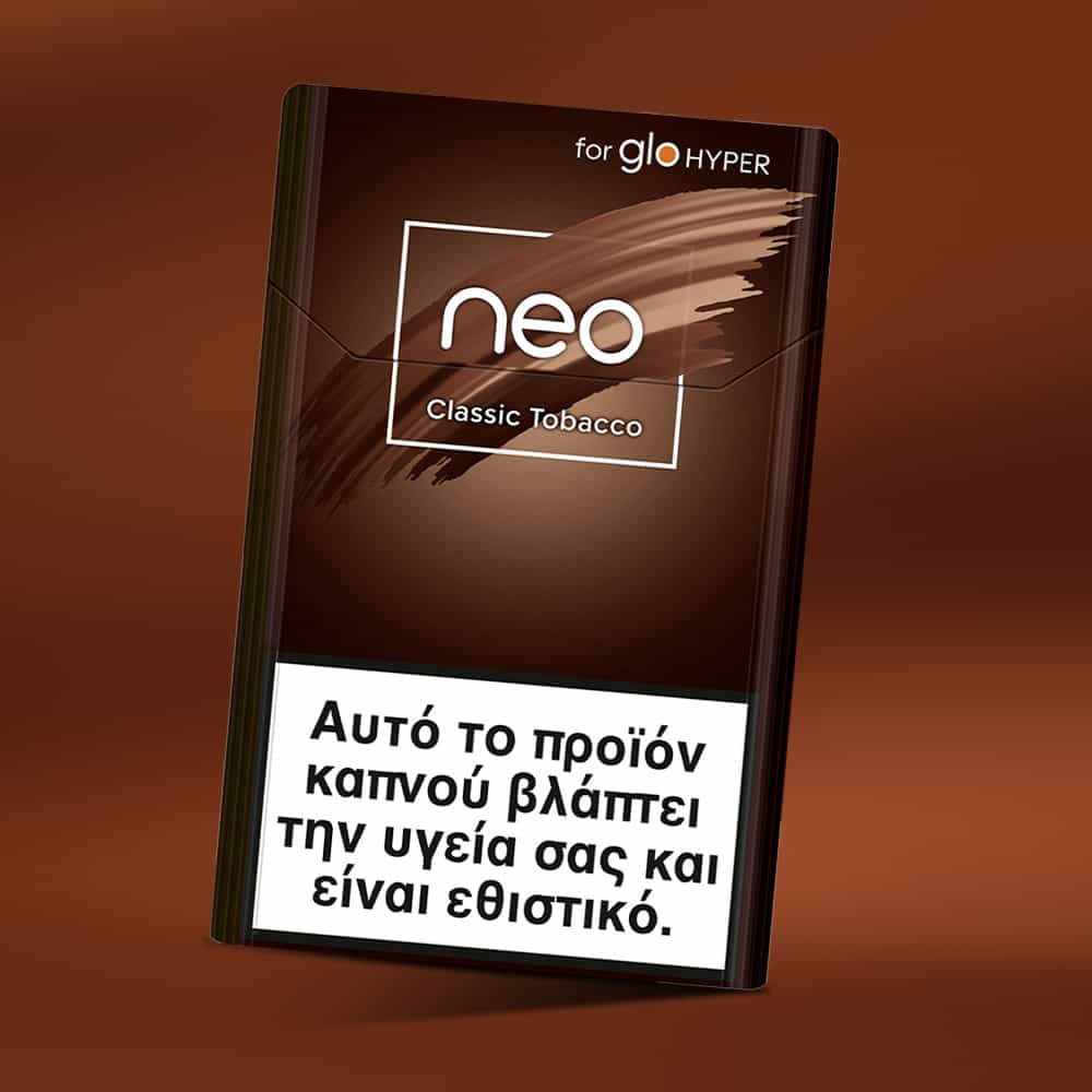 A brown pack of neo™ Classic Tobacco for glo HYPER stands upright. The Greek health warning at the bottom says: Αυτό το προϊόν καπνού βλάπτει την υγεία σας και είναι εθιστικό.
