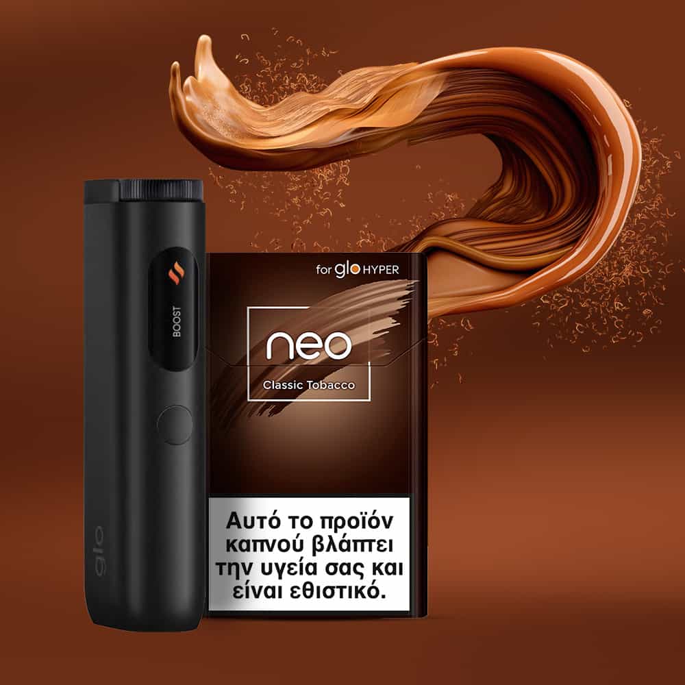 A black electronic device stands beside a box of neo™ Classic Tobacco, with swirling brown vapor above them. Greek text below warns about the health risks associated with smoking.