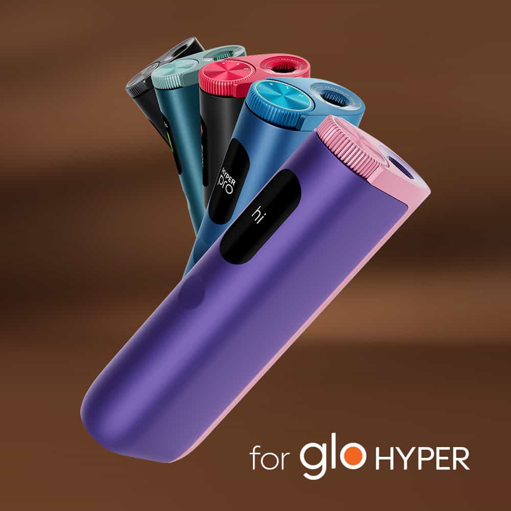 Five colorful cylindrical electronic devices are arranged diagonally on a brown background, highlighting Lucky Strike Rich Tobacco and evoking notes of rich tobacco with high-intensity blend inspiration.