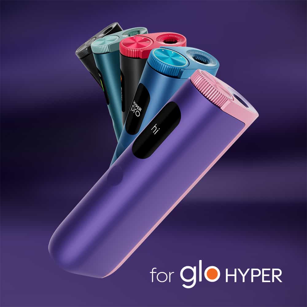 Five colorful veo™ Violet Click devices are displayed at an angle against a purple background, with their name written in white and orange text at the bottom right.