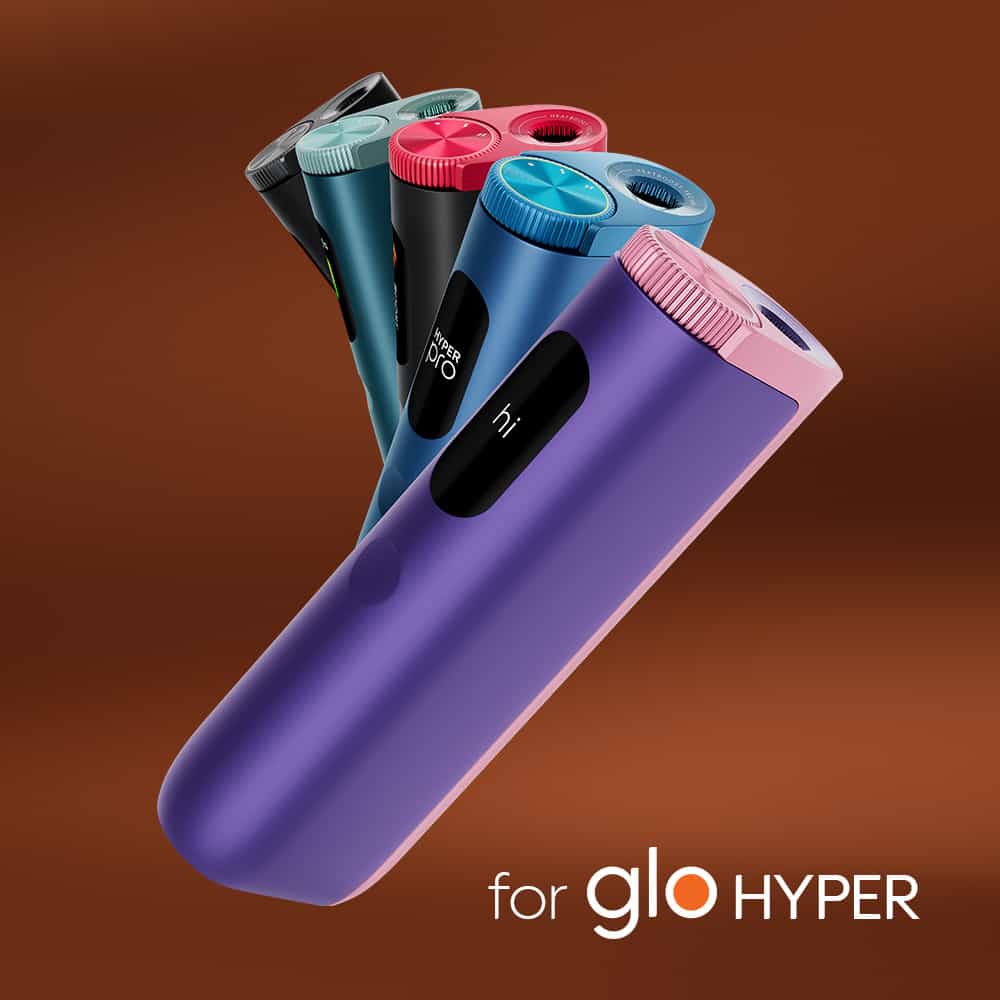 A display of six sleek, colorful neo™ Silver Tobacco devices standing upright on a brown gradient background, with "neo™ Silver Tobacco" text at the bottom right corner.