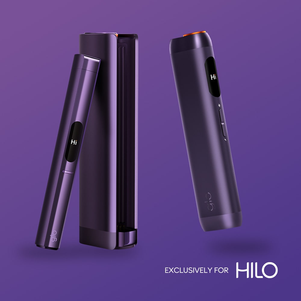 Two sleek rivo™ Violet Click devices are displayed on a purple background. One stands upright with “Hi” on its screen; the other shows its side. Text reads: Exclusively for HILO.