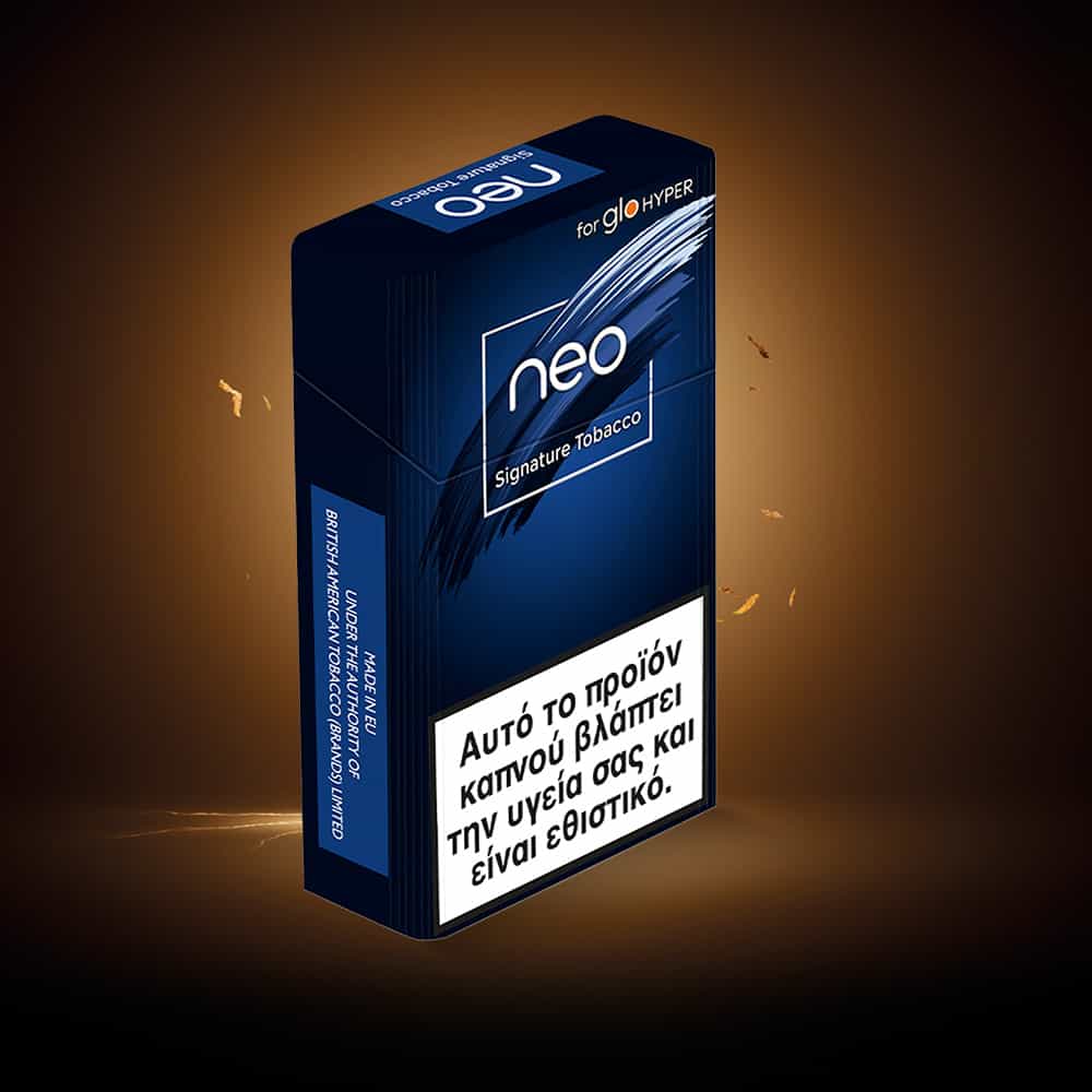 A blue and black pack of neo™ Signature Tobacco for glo Hyper stands upright on a dark background. The Greek warning states: This tobacco product damages your health and is addictive.