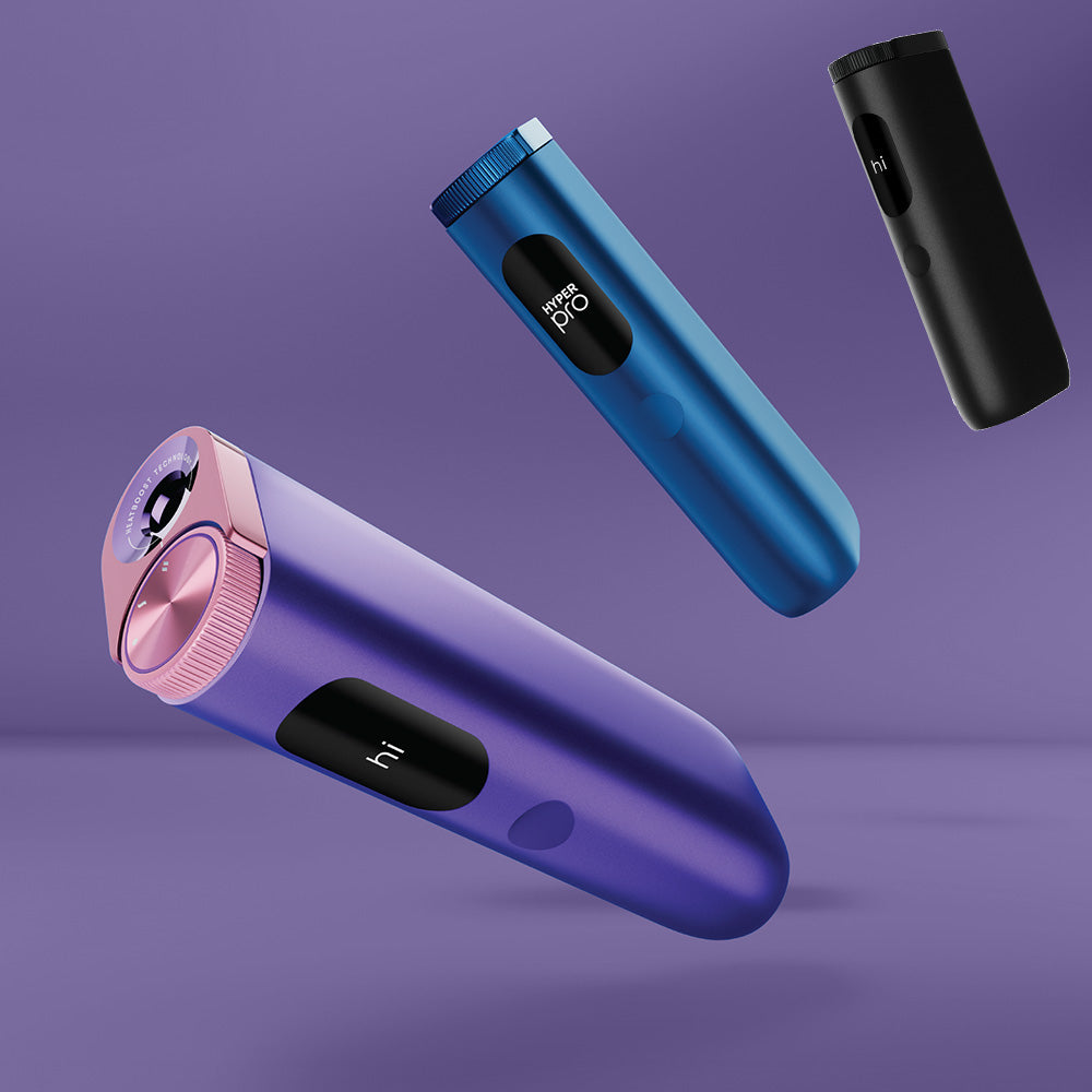 The glo™ HYPER PRO, available in purple, blue, and black, features a modern design with digital displays showing "hi" on the screens. The devices appear to float against a stylish purple background.