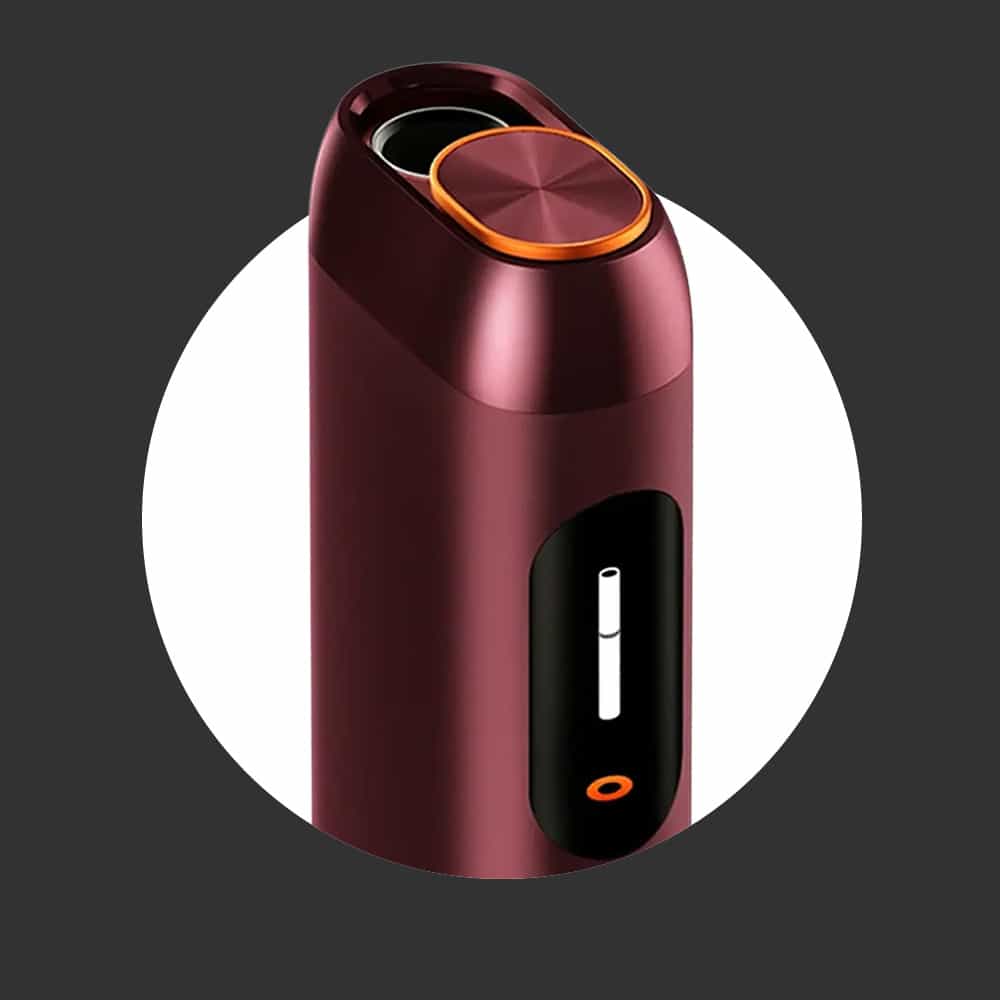 A sleek, maroon, cylindrical electronic device with a metallic top button and a small display screen, set against a white circle on a dark background.