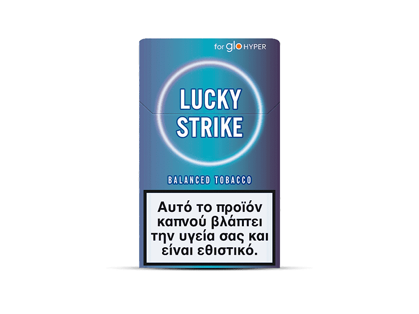 A pack of Lucky Strike Balanced Tobacco cigarettes with a blue design features mid-intensity, aromatic tobacco. A Greek health warning at the bottom states: This tobacco product damages your health and is addictive.