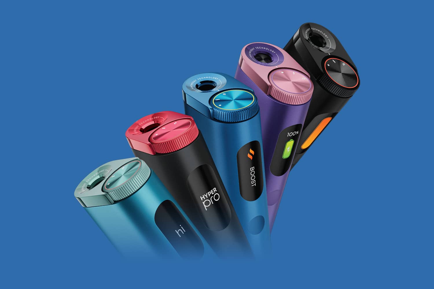 Five colorful electric shavers are displayed upright against a blue background. The shavers are in shades of blue, red, black, and purple, each with distinct design features and visible buttons or labels.