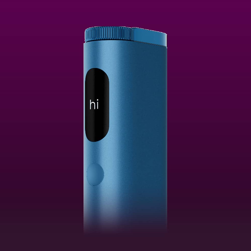 A sleek, blue cylindrical device with a small screen displaying the word hi and a button below it, set against a gradient purple background.